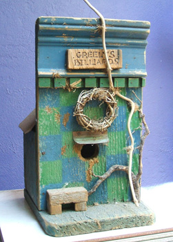 Birdhouse made from recycled fence boards