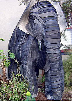 Elephant sculpture made from recycled tires.