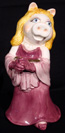 Miss Piggy vase, book, puppet